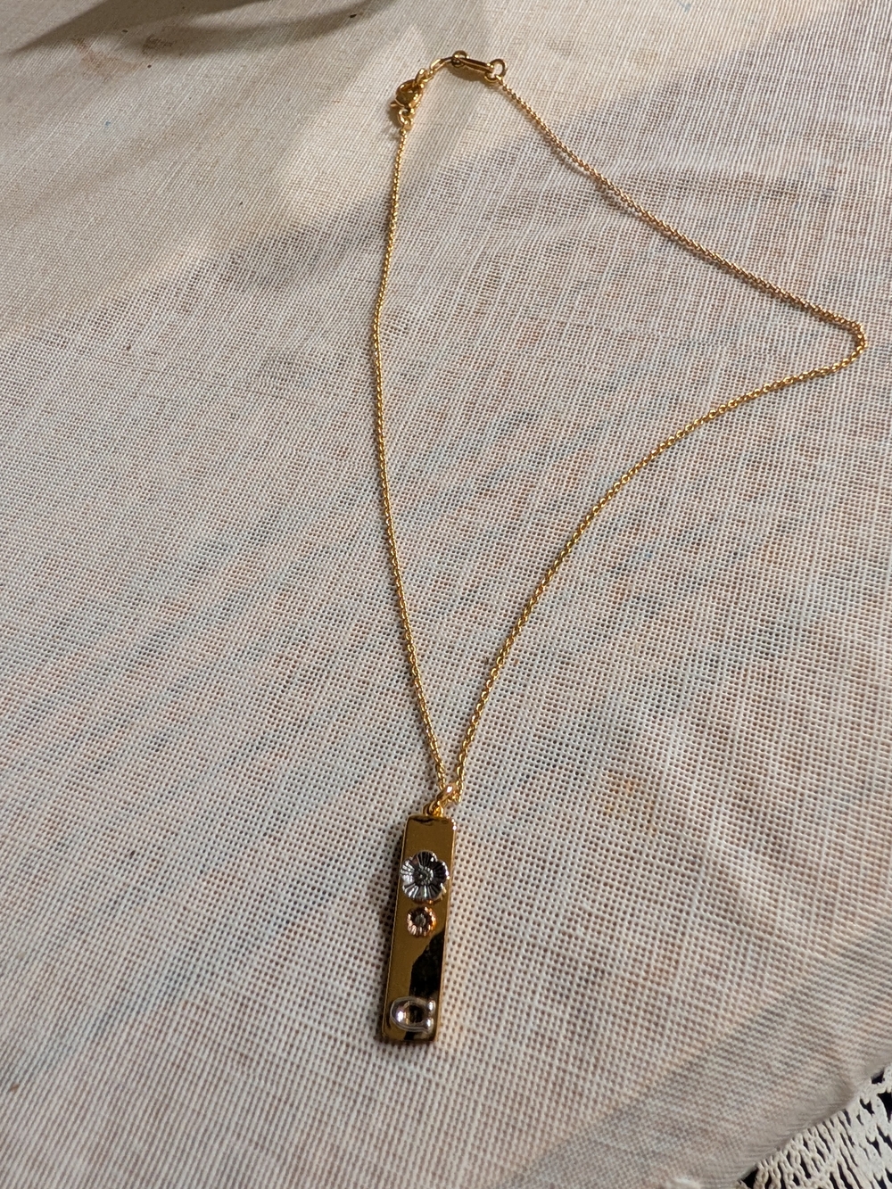 Coach Gold Tone Bar Pendant Necklace with Crystal Accents